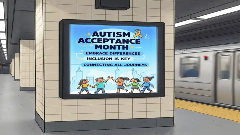 Digital screen display at MTA subway station showing Autism Acceptance Month animated message with blue color scheme and acceptance messaging