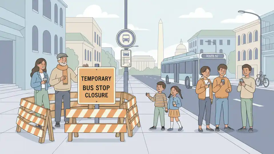 Bus stop closed sign with construction barriers on urban street