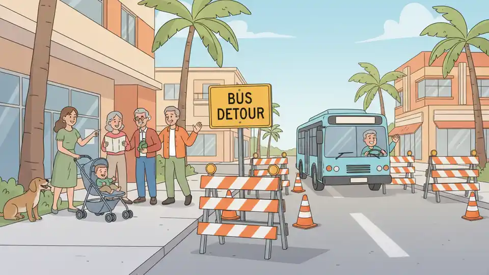 Bus detour sign and road construction barriers on urban street