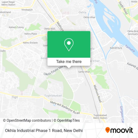 How to get to Okhla Industrial Phase 1 Road in Delhi by bus or metro?